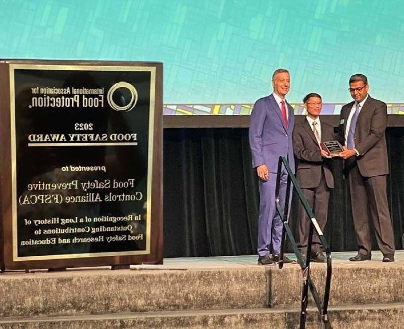 The Food Safety Preventive Controls Alliance (FSPCA) receives the IAFP 2023 Food Safety Award